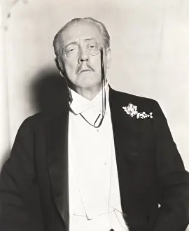 Snob: Distinguished man with monocle