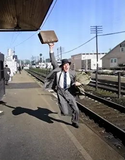 Topcoat: Distressed Man Late Businessman with Briefcase