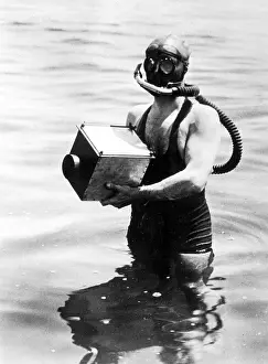 Breathing: Diver with underwater camera