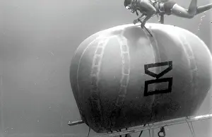 Canister: Diver with underwater house off the coast of Malta