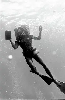 Flippers: Diver underwater off the coast of Malta