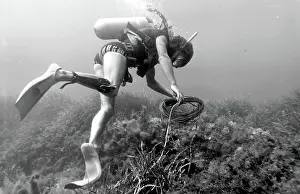 Canister: Diver underwater off the coast of Malta