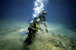 Canister: Divers on the seabed off the coast of Malta