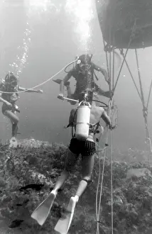 Shackle: Divers with underwater house off the coast of Malta