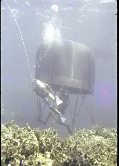 Flippers: Divers with underwater house off the coast of Malta