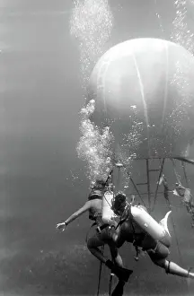 Canister: Divers with underwater house off the coast of Malta