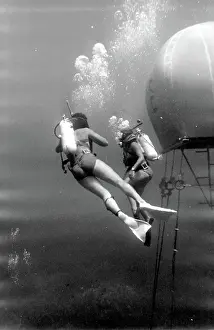 Canister: Divers with underwater house off the coast of Malta