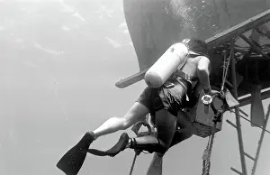 Canister: Divers with underwater house off the coast of Malta