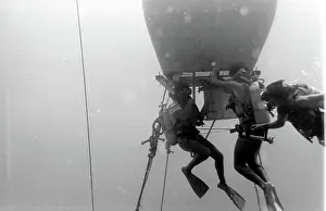 Canister: Divers with underwater house off the coast of Malta