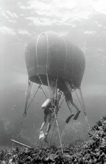 Canister: Divers with underwater house off the coast of Malta