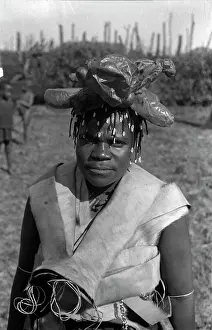 Diviner: Diviner with animal bladders on head
