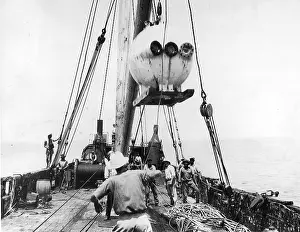 Zoologist: Diving ball Bathysphere attached to mooring ropes