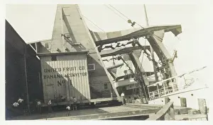 Sepia Images: Dockside conveying facility for loading bananas