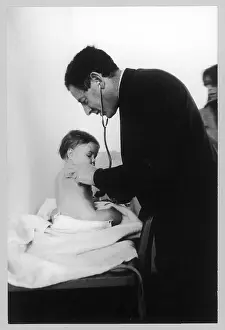 Stethoscope: DOCTOR EXAMINES BABY