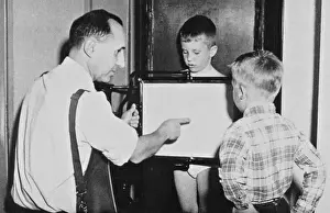 X Ray: Doctor Explains Fluoroscope to Young Boy
