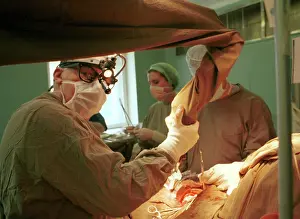 Improve: Doctor Leo Bokeria performs surgery, 1997