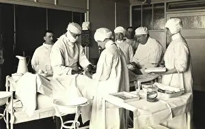 Surgery: Doctors operating on a patient at King George