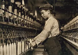 Doffer: A doffer boy in Globe Cotton Mill, Augusta, Ga
