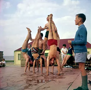 Helps: DOING HANDSTANDS