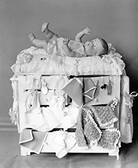 Stuffed: Doll on changing table, 1927