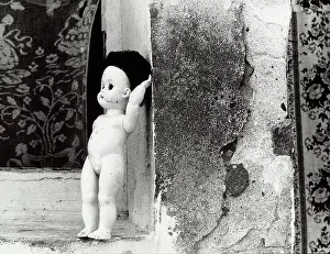 Windowsill: Doll on a window sill