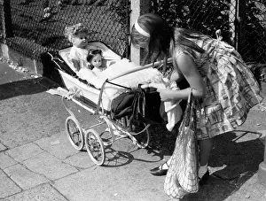 Pram: DOLLIES IN A PRAM