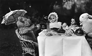 Teatime: Dolls, teddy and rabbit enjoying a tea party