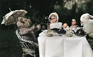 Teatime: Dolls, teddy and rabbit enjoying a tea party
