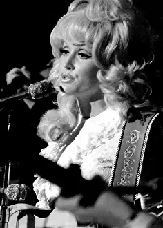 Press2: Dolly Parton performing in the early 1970s. ?