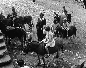 Henry Grant Collection: Donkey rides on the beach at Hunstanton