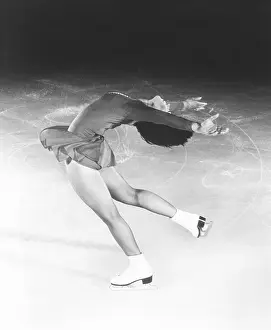 1462: Dorothy Hamill, star skater, performs a layback