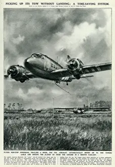 Swooping: Douglas Dakota picking up a glider, Normandy; Second World W