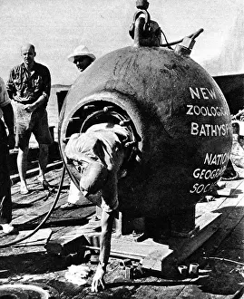 Otis: Dr. Beebe climbing out of his bathysphere, August 1934