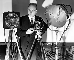 000th: Dr. Harold Edgarton, of M.I.T. stands behind ?