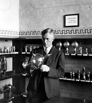 Langmuir: Dr. IRVING LANGMUIR, associate director ?
