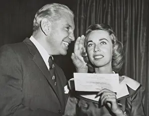 Shrink: Dr. Joyce Brothers holds her check for correctly