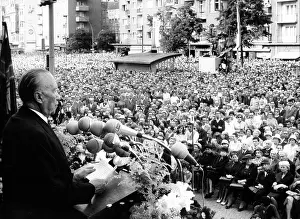 150000: Dr Konrad Adenauer, German Chancellor, speaks to Berliners