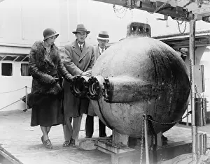 Submersible: Dr. William Beebe (center) standing with ?
