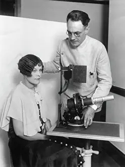 Redding: Dr. William D. Redding with his machine