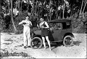 Chaps: Drinking by an Austin 7 car on the beach
