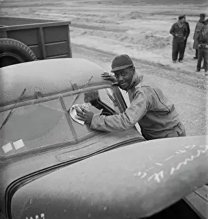 Old Fashion: The driver cleaning the desert dust off his