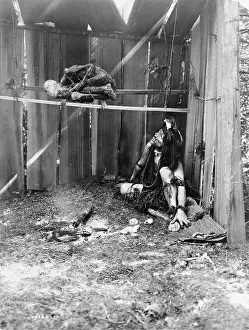 Coals: The drying mummy, Kwakiutl man inside board ?