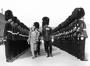 Reviewing: Duchess of York reviewing troops