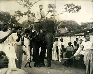 Senanayake: Dudley Senanayake riding an elephant, Ceylon (Sri Lanka)