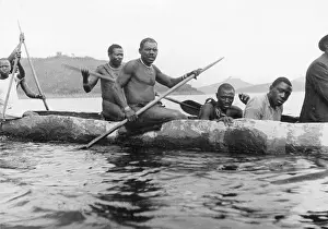 Zaire: Dugout rowers in the Congo, 1938