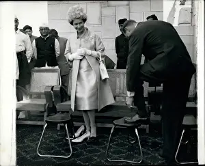 Shrines: Duke of Edinburgh changing into sandals on tour