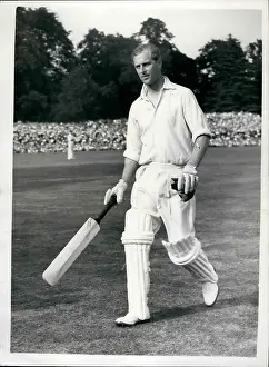 Batsmen: Duke of Edinburgh playing cricket, walking out to bat