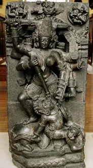 Deity: Durga killing the buffalo demon, Orissa, India. 13th century