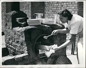 Sampled: Dustbin used as oven in demonstration, Stepney, East London