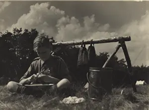 Culinary: Dutch boy scout preparing vegetables, Holland